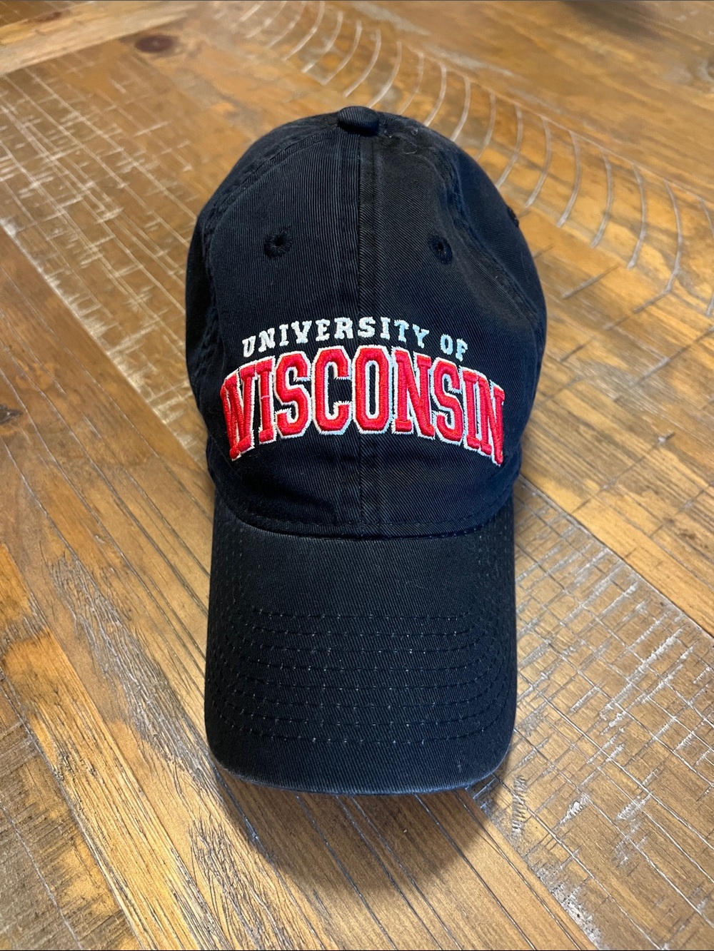 Legacy Black Cap with Red and White Wisconsin Embroidery